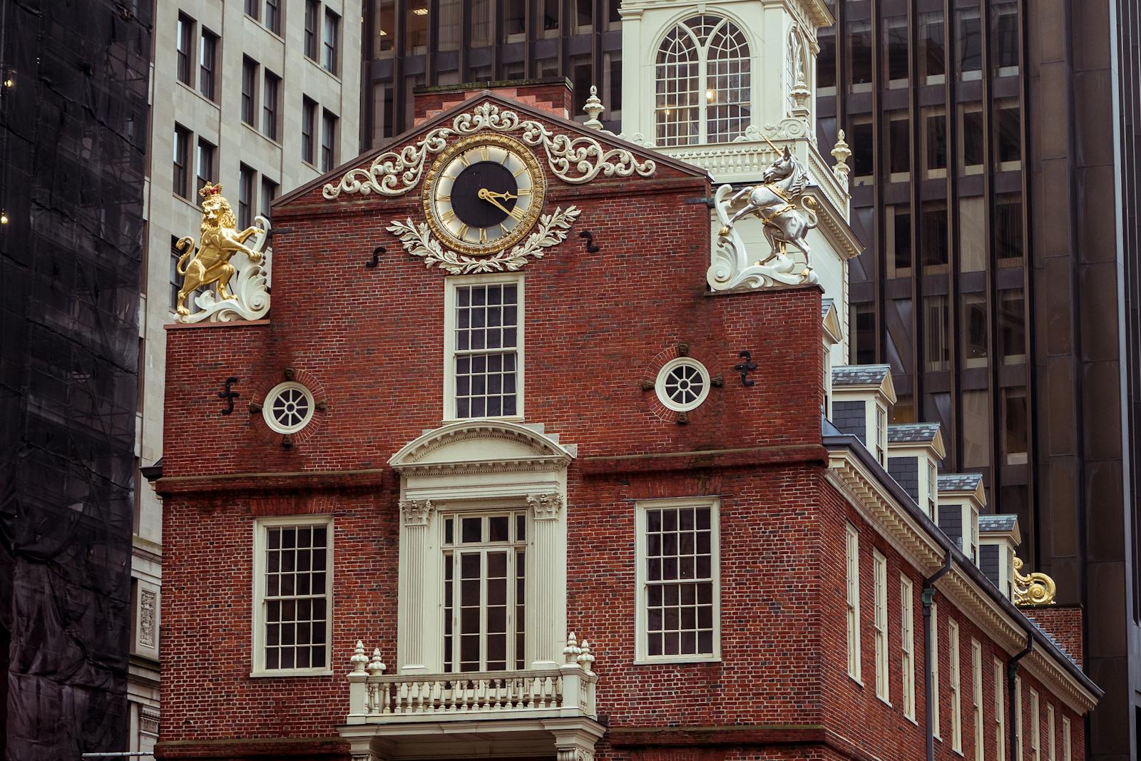 Old State House brick facade surrounded by downtown Boston buildings